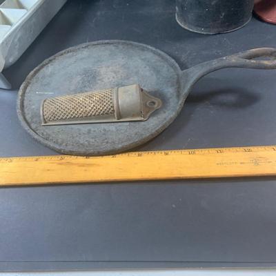 LOT 198: Primitive Kitchen Collection Including a Cast Iron Flat Griddle, Figidare Metal Icecube Tray, Tin Pudding Mold and Much More