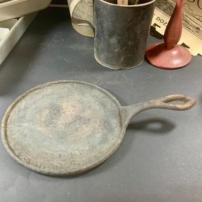 LOT 198: Primitive Kitchen Collection Including a Cast Iron Flat Griddle, Figidare Metal Icecube Tray, Tin Pudding Mold and Much More