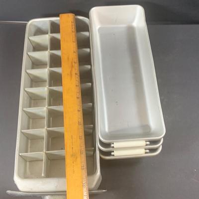 LOT 198: Primitive Kitchen Collection Including a Cast Iron Flat Griddle, Figidare Metal Icecube Tray, Tin Pudding Mold and Much More