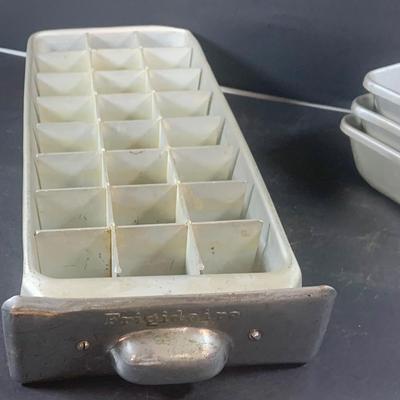 LOT 198: Primitive Kitchen Collection Including a Cast Iron Flat Griddle, Figidare Metal Icecube Tray, Tin Pudding Mold and Much More