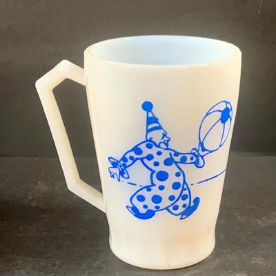 LOT 199: Circus Collection Including a Vintage Rolly Polly Clown, Bear on a Ball, Tin Toy Horse, Ringling Bros Lion Mug, Milk Glass Clown...