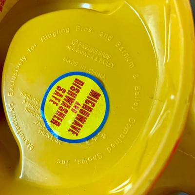 LOT 199: Circus Collection Including a Vintage Rolly Polly Clown, Bear on a Ball, Tin Toy Horse, Ringling Bros Lion Mug, Milk Glass Clown...