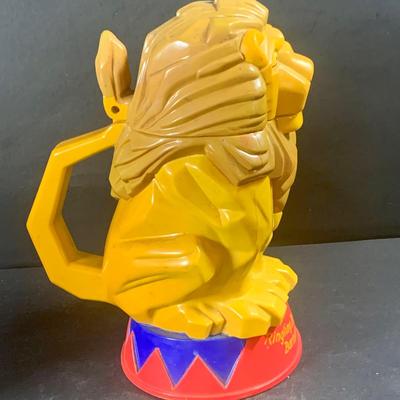 LOT 199: Circus Collection Including a Vintage Rolly Polly Clown, Bear on a Ball, Tin Toy Horse, Ringling Bros Lion Mug, Milk Glass Clown...