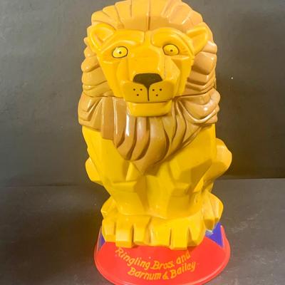 LOT 199: Circus Collection Including a Vintage Rolly Polly Clown, Bear on a Ball, Tin Toy Horse, Ringling Bros Lion Mug, Milk Glass Clown...