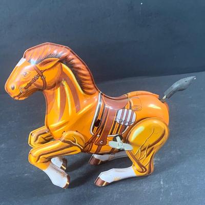 LOT 199: Circus Collection Including a Vintage Rolly Polly Clown, Bear on a Ball, Tin Toy Horse, Ringling Bros Lion Mug, Milk Glass Clown...