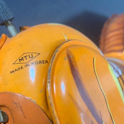 LOT 199: Circus Collection Including a Vintage Rolly Polly Clown, Bear on a Ball, Tin Toy Horse, Ringling Bros Lion Mug, Milk Glass Clown...