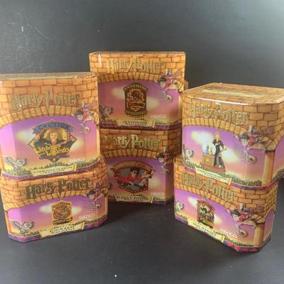LOT 202: Collection of Enesco Harry Potter Plaques and Figurine In Original Boxes