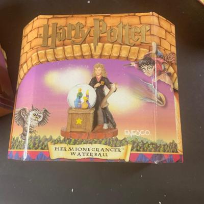 LOT 202: Collection of Enesco Harry Potter Plaques and Figurine In Original Boxes