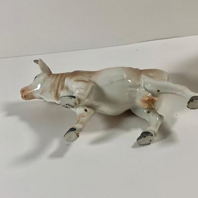 LOT 209: Vintage Black Americana McCoy Cookie Jar, a Cow Creamer and More