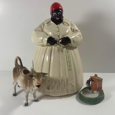 LOT 209: Vintage Black Americana McCoy Cookie Jar, a Cow Creamer and More