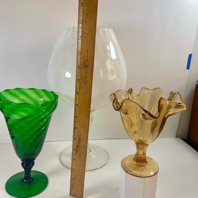 LOT 211: Beautiful Collection of Art Glass Including Large White Sniftner Goblet Made in Italy, Green Vase and Ruffled Top Amber Vase