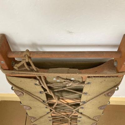 LOT 245: Vintage Military Collection - Pack Board Ladder, G.I. Type Small Foot Locker and Canvas Belt