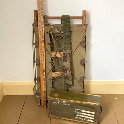 LOT 245: Vintage Military Collection - Pack Board Ladder, G.I. Type Small Foot Locker and Canvas Belt