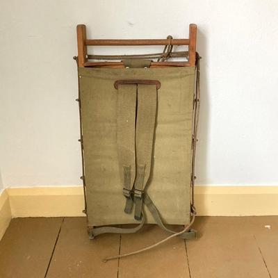 LOT 245: Vintage Military Collection - Pack Board Ladder, G.I. Type Small Foot Locker and Canvas Belt