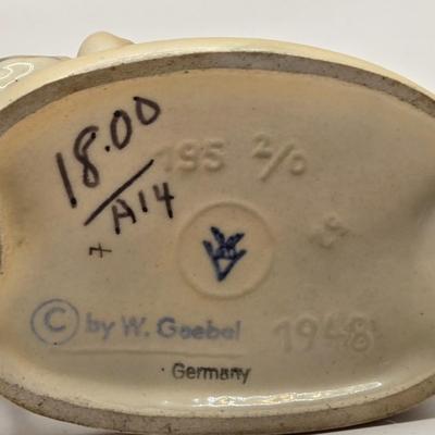 LOT 272: Enesco Boy Figure with Umbrella & Vintage Goebel HUMMEL Figure of Boy on Fence