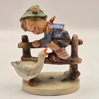 LOT 272: Enesco Boy Figure with Umbrella & Vintage Goebel HUMMEL Figure of Boy on Fence