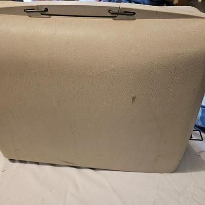 Vintage NECHI Sewing machine with sewing items and fabric