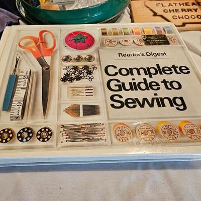Vintage NECHI Sewing machine with sewing items and fabric
