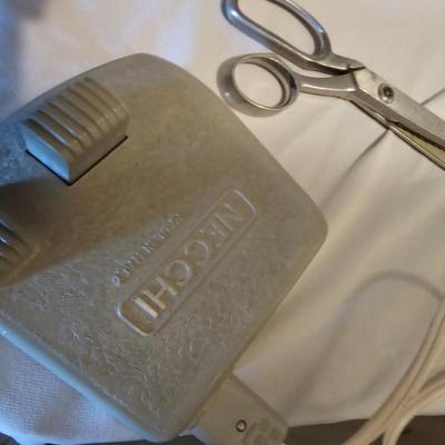 Vintage NECHI Sewing machine with sewing items and fabric
