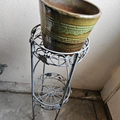 Metal plant stand with pottery pot