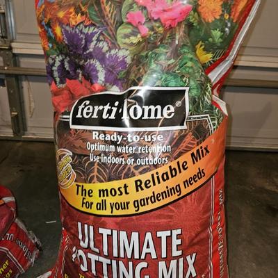 Gardening items -Pruning shears, Potting soil, Plant chemicals and fertilizers, gloves, long watering wand - tarp and more