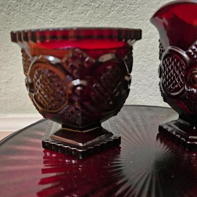 Avon Cape cod Ruby red sugar, cream, pedestal bowl, vegetable bowl, candle stick holders, and a cake plate