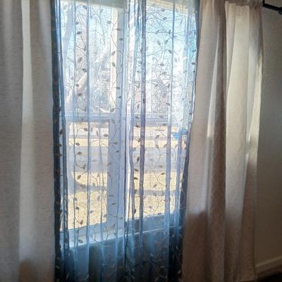 Three sets of Curtains