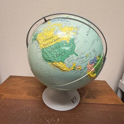 Sale Photo Thumbnail #106: Plastic stand, dual axis support ring.  Has a small dent in the bottom of the globe near Antartica, otherwise in very good condition. Most likely from the 1990's.