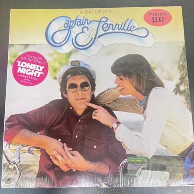 Vintage Vinyl Album Lot: ABBA, Gordon Lightfoot, Captain & Tennille, and Disco Around the Globe