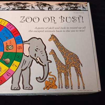 NEW "ZOO OR BUST" A GAME OF SKILL AND LUCK TO ROUND UP ALL THE ESCAPED ANIMALS BACK TO THE ZOO TO WIN!