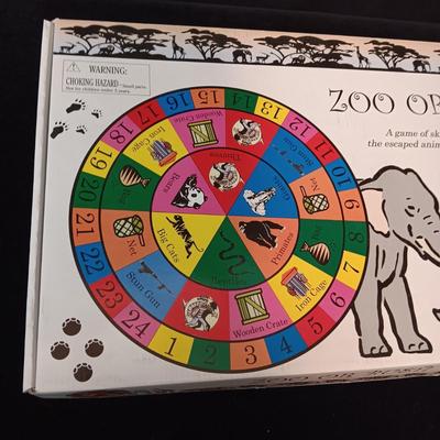 NEW "ZOO OR BUST" A GAME OF SKILL AND LUCK TO ROUND UP ALL THE ESCAPED ANIMALS BACK TO THE ZOO TO WIN!