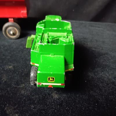 HUBLEY METAL TOY TRAILERS AND AN ERTL JOHN DEERE COMBINE