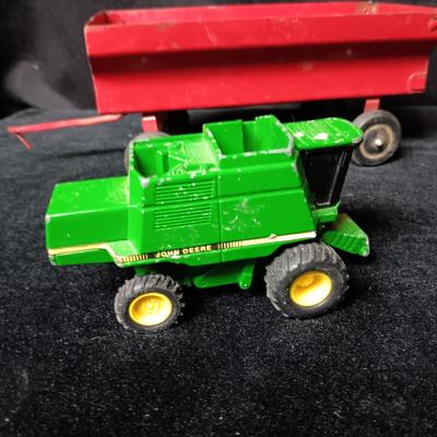 HUBLEY METAL TOY TRAILERS AND AN ERTL JOHN DEERE COMBINE