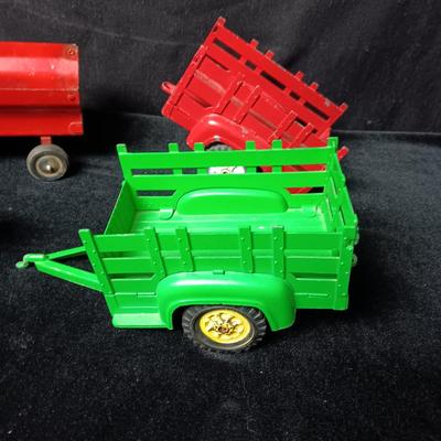 HUBLEY METAL TOY TRAILERS AND AN ERTL JOHN DEERE COMBINE