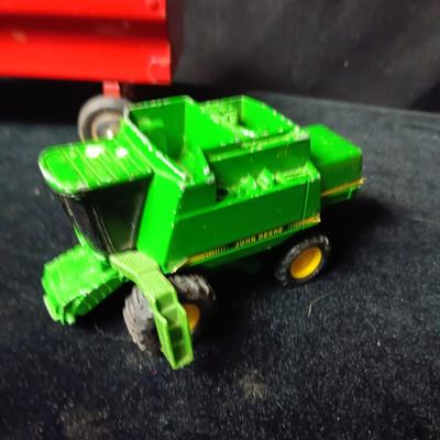 HUBLEY METAL TOY TRAILERS AND AN ERTL JOHN DEERE COMBINE