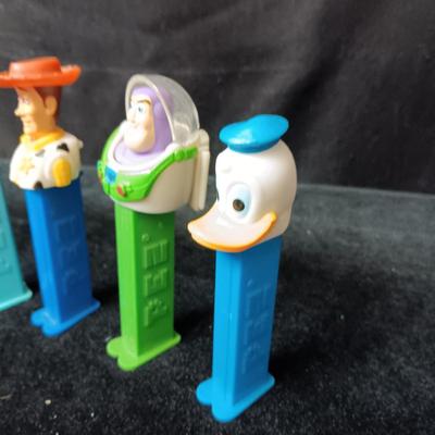 A COLLECTION OF PEZ DISPENSERS