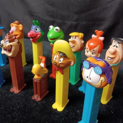 AN ASSORTMENT OF PEZ DISPENSERS
