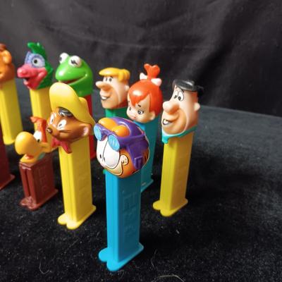 AN ASSORTMENT OF PEZ DISPENSERS