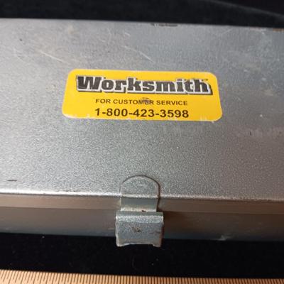 METAL HINGED BOX FULL OF FOLD UP DRILL BITS