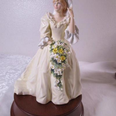 Royal Doulton Princess Diana figurine on wood base