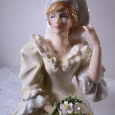 Royal Doulton Princess Diana figurine on wood base