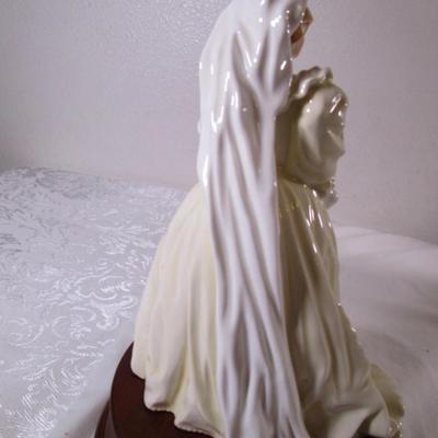 Royal Doulton Princess Diana figurine on wood base