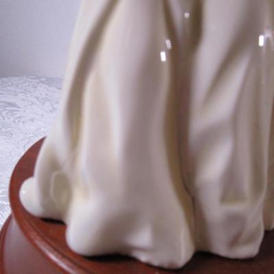 Royal Doulton Princess Diana figurine on wood base
