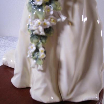 Royal Doulton Princess Diana figurine on wood base
