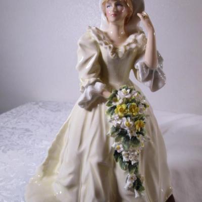 Royal Doulton Princess Diana figurine on wood base
