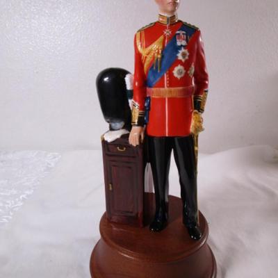 Royal Doulton Prince Charles figurine on wood base