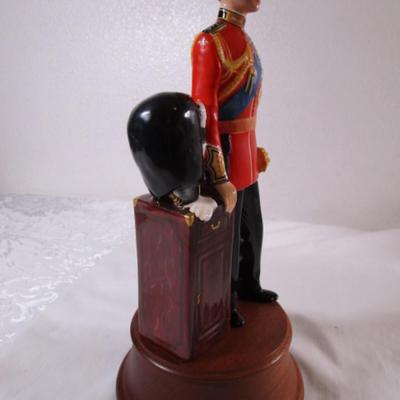 Royal Doulton Prince Charles figurine on wood base