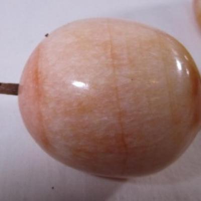 Polished stone fruit - peach