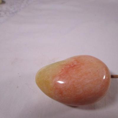 Polished stone fruit - mango