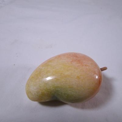 Polished stone fruit - mango